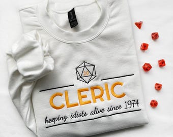 Cleric Embroidered Sweatshirt | keeping idiots alive since 1974