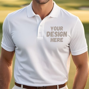 May include: A white polo shirt with a brown collar and buttons. The shirt has the text "YOUR DESIGN HERE" printed on the front.
