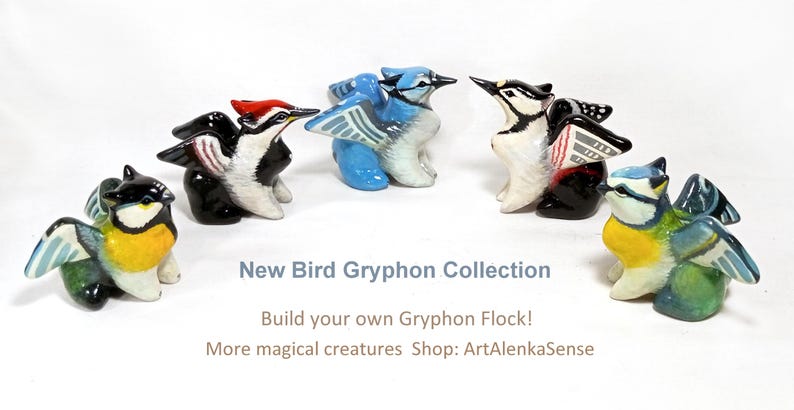 May include: A collection of ceramic bird gryphon figurines in various colors, including blue, yellow, black, and red. The figurines are arranged in a semi-circle. Text on the image reads "New Bird Gryphon Collection" and "Build your own Gryphon Flock!"