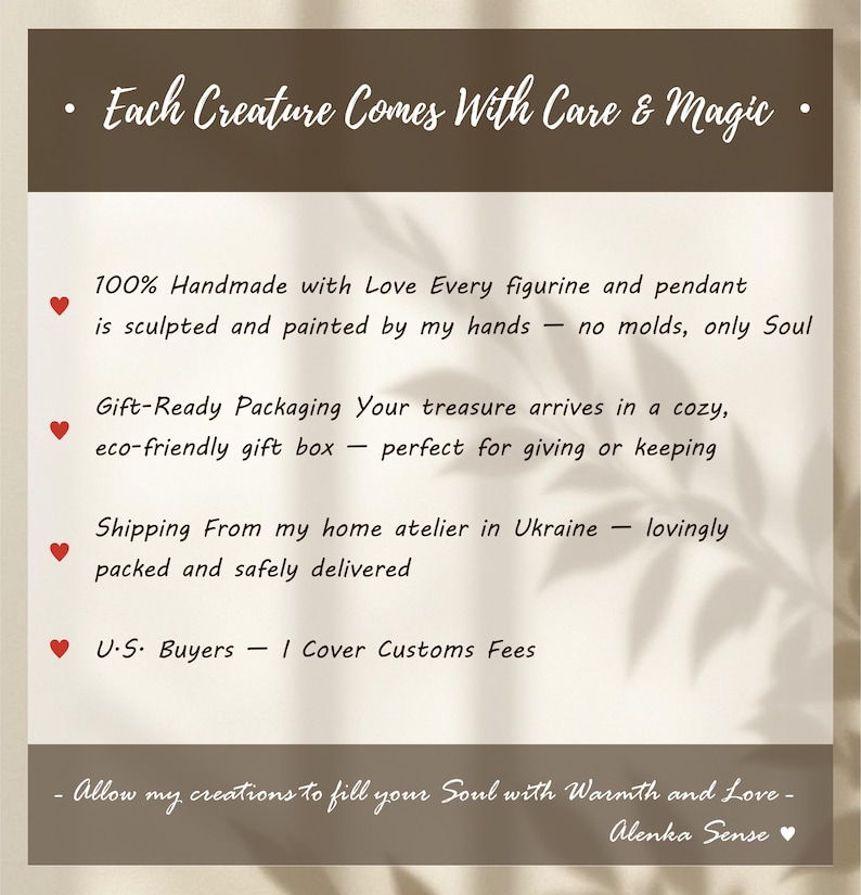 May include: A cream-coloured card with brown borders and text. The text reads "Each Creature Comes With Care & Magic." Additional text describes handmade figurines and pendants, gift-ready packaging, and the artist's location.