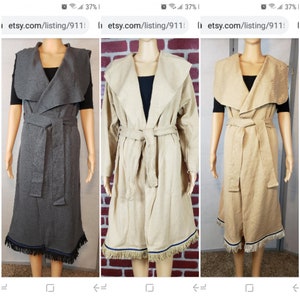 May include: Three long cardigans with a shawl collar and a tie belt. The cardigans are shown in gray, beige, and brown. Each cardigan has a fringe trim at the bottom.