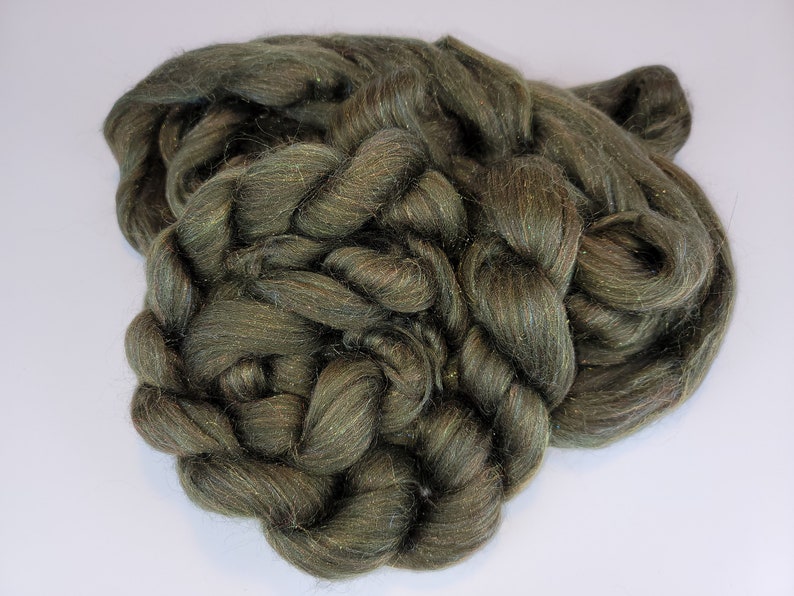 4 ounce dyed Merino and Rainbow Firestar combed toproving