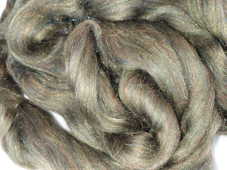 4 ounce dyed Merino and Rainbow Firestar combed toproving