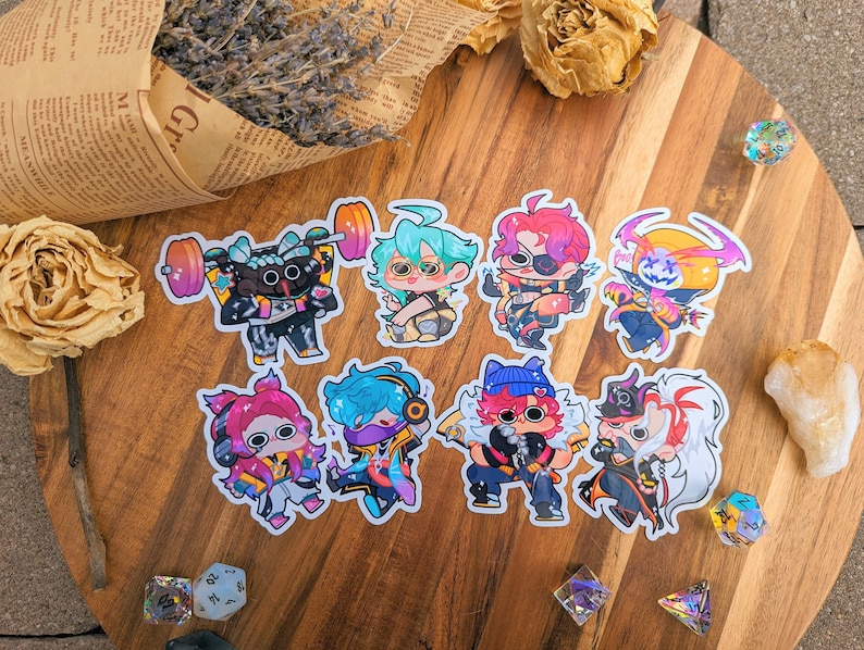 May include: Eight colorful cartoon character stickers featuring a variety of poses and expressions. The stickers are printed on clear vinyl and have a glossy finish.