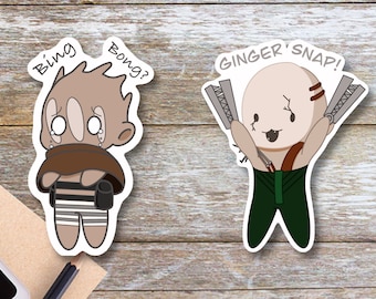 May include: Two cartoon stickers on a wood background. The sticker on the left is brown and white and says "Bing Bong?" The sticker on the right is green and white and says "Ginger Snap!"