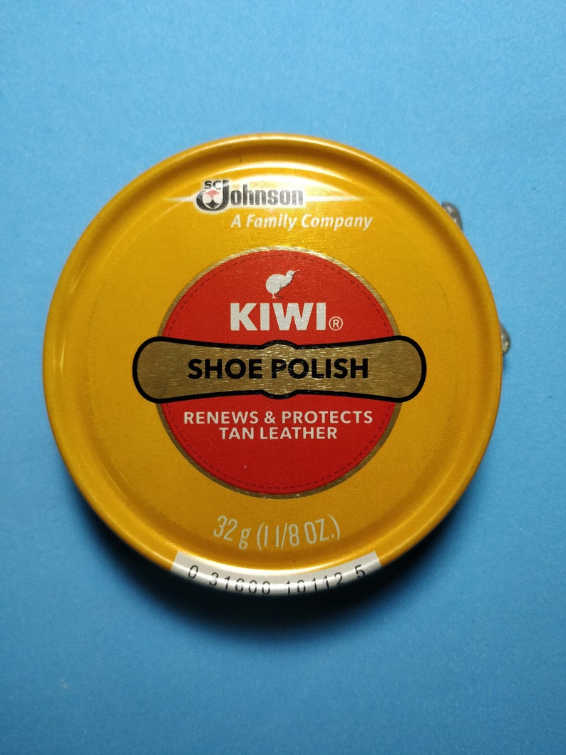polishing boots with kiwi