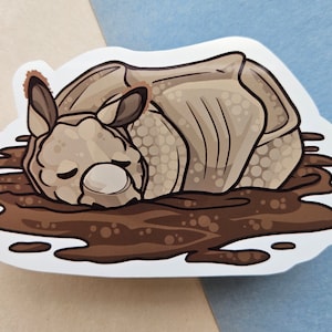 Sleeping Rhino In A Mud Puddle Sticker