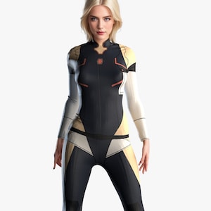 May include: A woman wearing a black and white jumpsuit with a yellow accent. The jumpsuit has a high neckline and long sleeves. The woman is standing with her legs slightly apart and her arms at her sides.