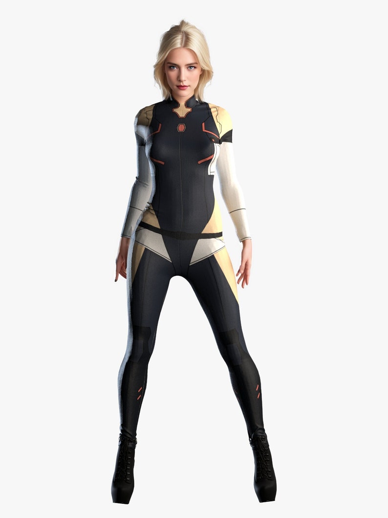 May include: A woman wearing a black and white jumpsuit with a yellow accent. The jumpsuit has a high neckline and long sleeves. The woman is standing with her legs slightly apart and her arms at her sides.