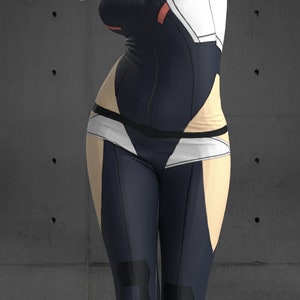 May include: A black and white jumpsuit with red accents. The jumpsuit has a zipper down the front and a belt around the waist. The legs of the jumpsuit are tight-fitting and have a geometric pattern.