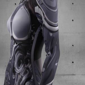 Puede incluir: Un body ajustado con un dise&ntilde;o futurista. La prenda presenta un patr&oacute;n abstracto y arremolinado en tonos grises, negros y blancos. El dise&ntilde;o crea un efecto tridimensional, con luces y sombras que acent&uacute;an los contornos del cuerpo.