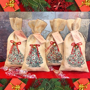 Set of 4 Hand-stamped Christmas Tree Burlap Reusable Gift Bags with Gift Tag. Dimensions-7 inches by 13 inches.