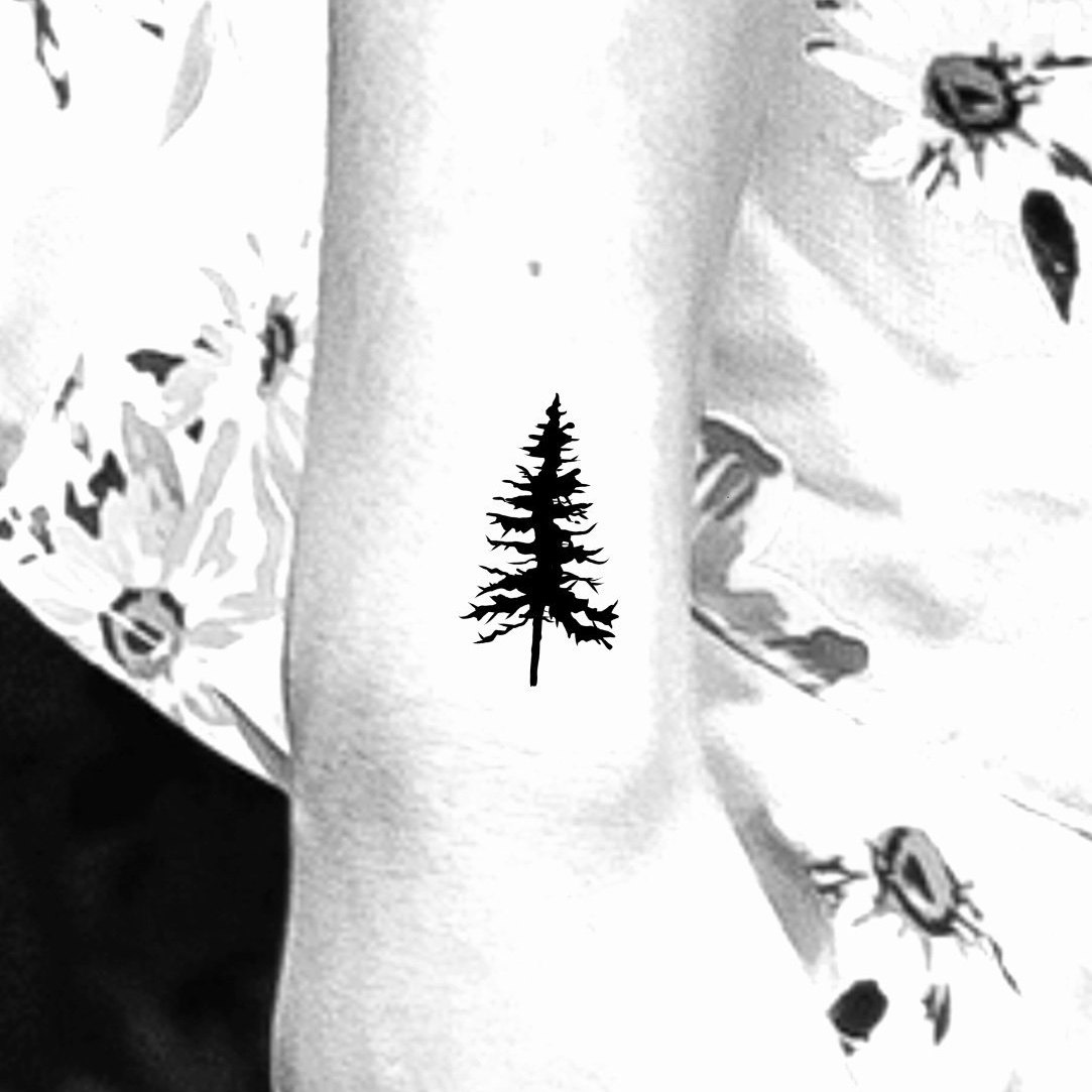 Why not check these extraordinary minimalist pine tree tattoo designs