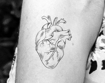 human heart tattoos black and white
