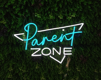 May include: Neon sign with white and blue lettering that reads "Parent Zone" against a green wall.