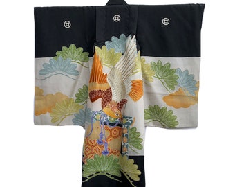 Vintage black and cream silk boys kimono with colorful hawk and pine motifs