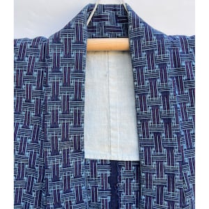 Dark indigo cotton kimono with pale blue and red basketweave pattern