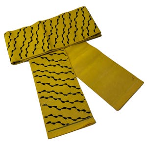 Yellow silk faille hanhaba obi with diagonal black vines