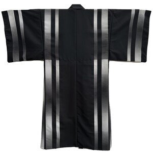 May include: Black and white striped kimono with a traditional Japanese design. The kimono is made of a soft, lightweight fabric and has a relaxed fit.