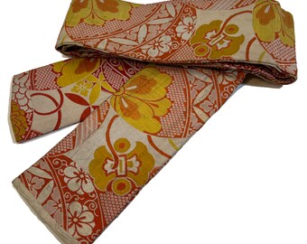 Antico obi per bambini in broccato di seta con motivi floreali intrecciati e finti shibori