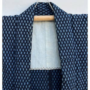 Deep indigo kasuri cotton kimono with pale blue dash pattern