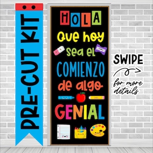 May include: A black chalkboard door sign with the text "HOLA que hoy sea el COMIENZO de algo GENIAL" in colorful letters. The sign is decorated with colorful school supplies and a red apple. The text "SWIPE for more details" is on a white sticker on the right side of the sign.