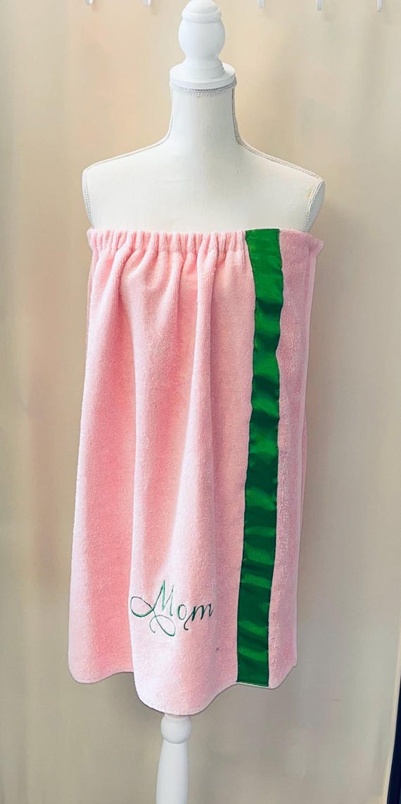 Pink towel spa wrap with green trim