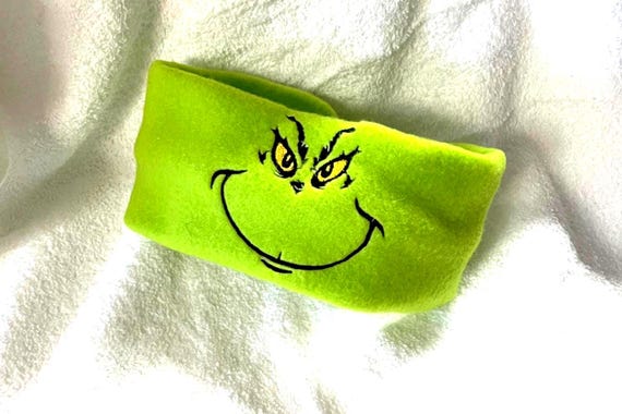 Unisex ear warmers for the entire family: Grinch's smile design warm fleece fabric material