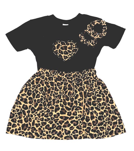 Leopard/ Animal printed children outfit made with black lining and comes with  matching hair tie