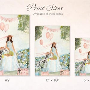 May include: Watercolor print of a woman in a light blue dress and hat, holding a basket, with a Dalmatian dog. Pink balloons and a banner decorate the scene. Available in three sizes: A2, 8" x 10", and 5" x 7".
