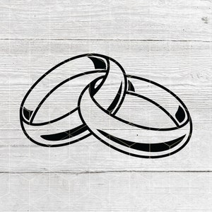 Peut inclure: Deux anneaux entrelacés, symbole d'amour et d'engagement, sont représentés dans une illustration en noir et blanc.