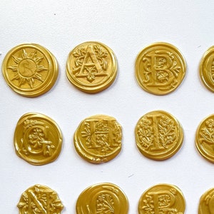 Pacote de 50 selos de cera dourada [autoadesivo, dourado, sofisticado, letra serifada, flexível]