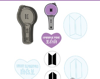 May include: A set of printable 3D model files for a BTS light stick, a heart with the text "I Purple You! 보라해", and a logo with the letters "BT" in a stylized font. The text "NEW MODEL PRE-SALE" is at the top of the image. The text "@digicanal3d" is at the bottom of the image.