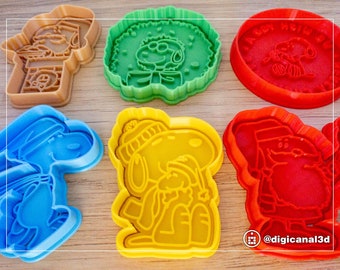 Christmas Snoopy Cookie Cutter Set of 6. Includes Snoopy Santa, ice skating, Woodstock hug. Colorful and Highly detailed Stamps with handles