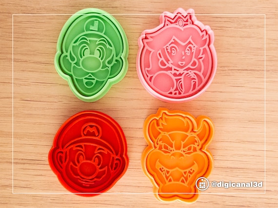 Super Mario Bros Cookie Cutter Set with handle. Includes Luigi, Princess Peach, Bowser. Works for Fondant, Cupcake toppers and Polymer Clay.
