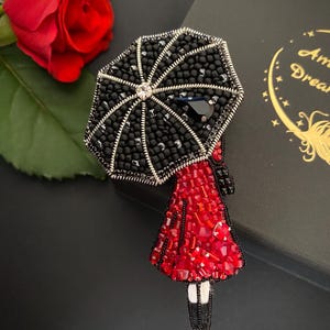 Woman in Red with Umbrella brooch, handmade beaded pin