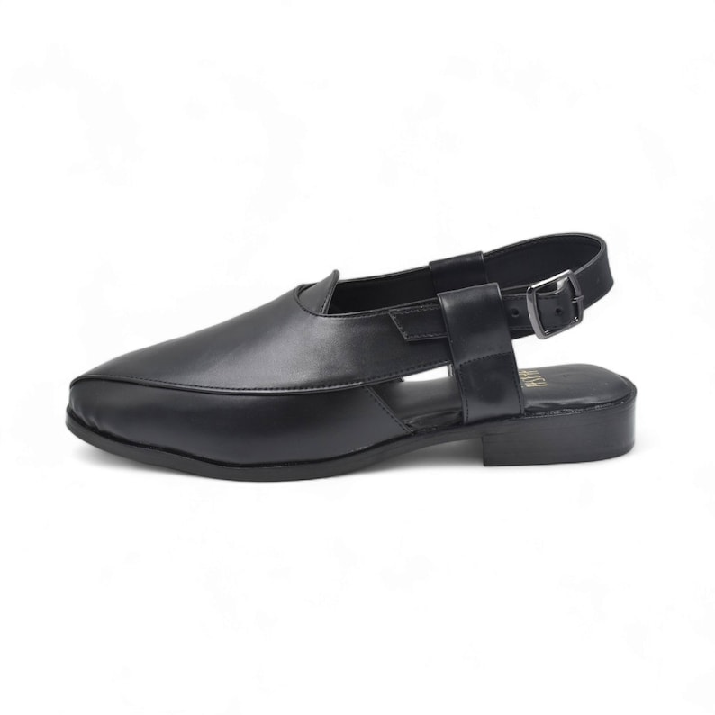 May include: Black leather slip-on sandals with a slingback strap and buckle closure.