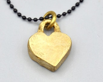 Small  heart brass pendant necklace for her .