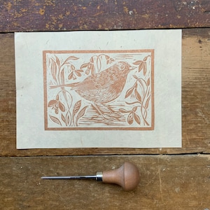 Linocut print Little Robin and snowdrops Gorgeous copper Lokta paper Copper ink A5 Gold on Cream Lokta