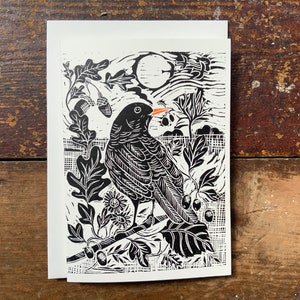 Morning Mr Blackbird Black em base creme com um pop de laranja!
