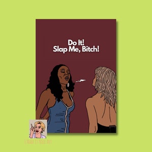 May include: A digital illustration of two women. The woman on the left is Black and has long black hair. She is wearing a blue dress with a white trim. The woman on the right has long blonde hair and is wearing a black dress. The text "Do It! Slap Me, Bitch!" is written in white letters on a maroon background.