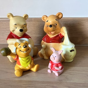 Collection of Winnie The Pooh Figurines