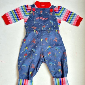 Chucky Overalls and Dark Blue Sweater