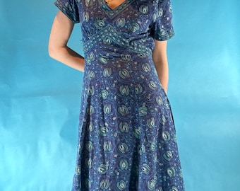Vintage 1970s Blue Green Block Printed V Neck Short Sleeved Midi/Maxi Folk Dress with Tie Back.