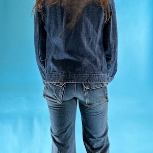 Vintage Y2K Boot Cut Flare Low Rise Washed Denim Jeans with Raw Edge Hem.