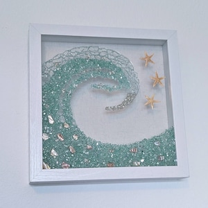 Beautiful, Glass, Ocean Wave with sea shell pieces and 3 real Starfish. Quality design and art decor. Bring a piece of the beach home.