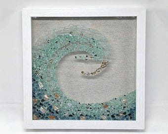 Gorgeous Ocean Wave Art in Seaglass colored, crushed glass. Frame color options with crushed sea shells and sleek clean front. Great gift!
