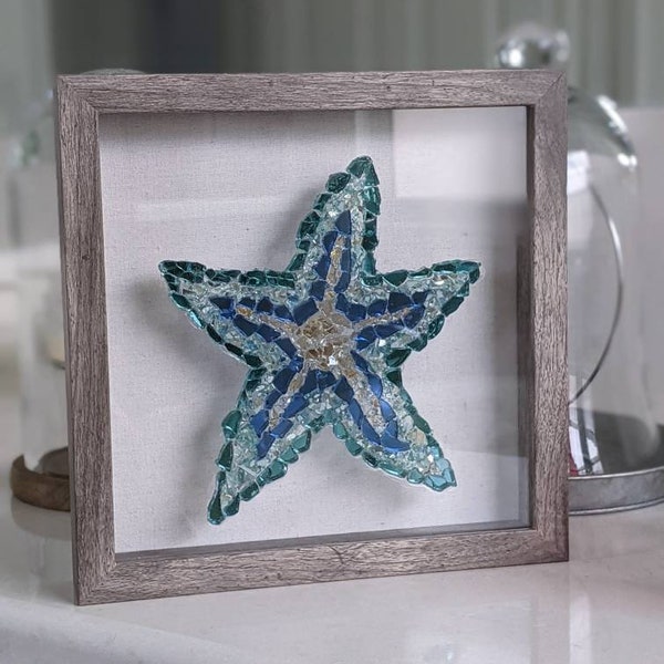 Crushed Glass Starfish in Teal, Blue, Aqua, and Gold. Shadowbox options are Gray, White, Black . Take a piece of the beach home. Great Gift.