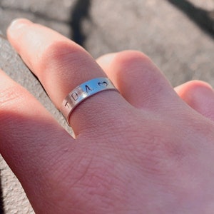 Engraved initial ring