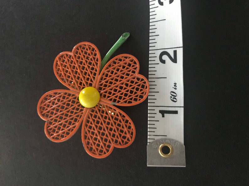 Vintage Orange metal flower brooch